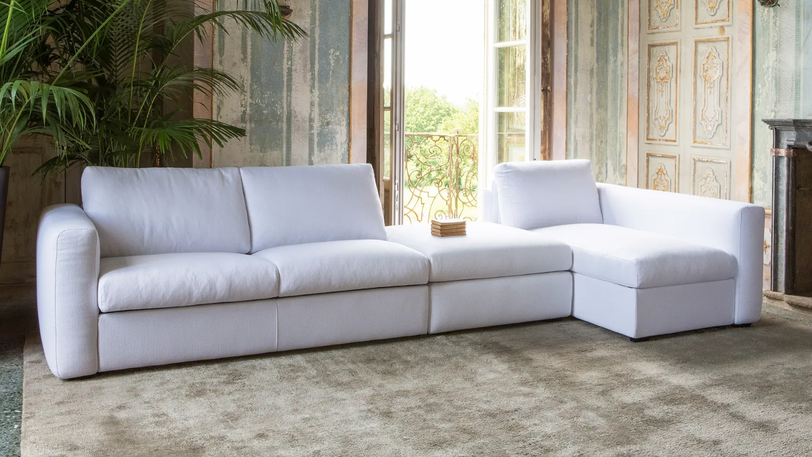Divano imbottito componibile con penisola Morbidone di Family Bedding