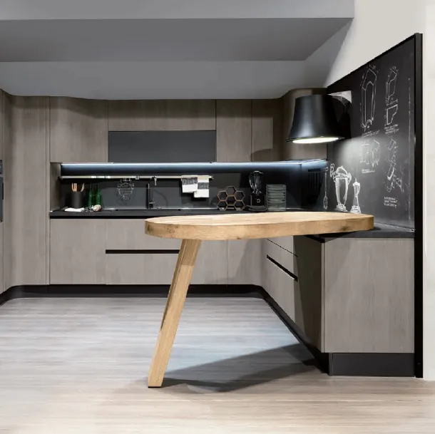 Cucina Design angolare con penisola Penelope in natural Ash con piano snack in ulivo massello di Aran